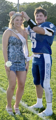 EMERSON LOWRY crowns Ashlyn Hahn after they were announced as the 2024 SHS Homecoming Queen and King.The event was held before the football game on Friday, September 13th.