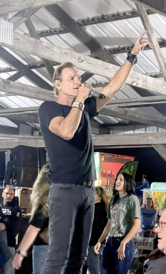 MUCH TO THE DELIGHT of Friday night’s Rooks County Free Fair crowd, PARAMOUNT’S lead singer, Eddie Light, uses the band’s high energy to make sure everyone has a rock-n-roll good time.
