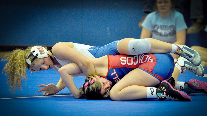 LADY TIGER JUNIOR ASHLYN HAHN gets a fall during the dual with Russell which Stockton hosted last Thursday. On Friday, Hahn went on to pick up four more falls against her opponents at the Girls Panther Classic held in Phillipsburg. Hahn is nearing 100 wins in her career.