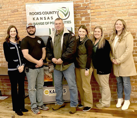 FOUR ROOKS COUNTY BUSINESS HONOREES stand with their awards during the Business Appreciation event at Letha’s Event Space in Plainville. From left to right are: Ashley Comeau, Adam Comeau (Brant’s), Brian Newell (Newell Plumbing &amp; Electric), Justine Benoit, Ali Keller (Mid-America Bank), and Shelbe Darnell (Restoration Health &amp; Chiropractic). (Courtesy Photo)