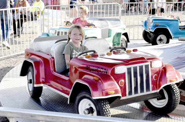AVERY KUHLMANN may have considered looking for the air conditioning button on her Rubicon to battle the hot and humid temperatures fairgoers experienced on Wednesday night of the Rooks County Free Fair. She is the daughter of Shelby Kuhlmann and Mitchell Kuhlmann.