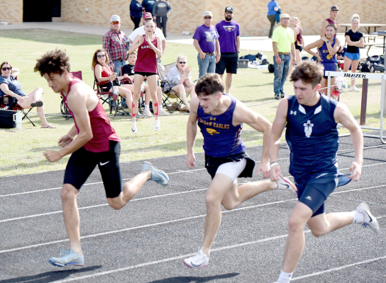 PLAINVILLE’S DAVYN WILLEFORD turns on the jets as he sprints to a first-place finish in the 110m hurdles at the Victoria Invitational with a time of 15.96. (Photo courtesy of Candace Rachel)
