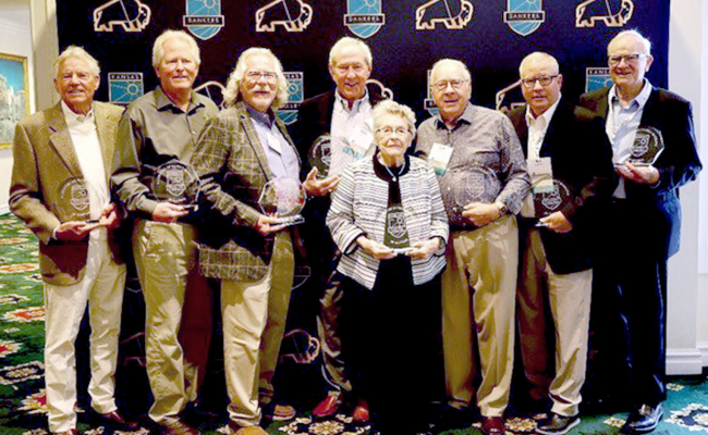 PICTURED is the Berkley family after receiving the Century of Family Banking Award this summer. Pictured are (from left to right) James Berkley, Solutions North Bank Chairman; Jeff Berkley, Alliance Bank Chairman; Burke Matthews, President Emeritus, Bennington State Bank; Mike Berkley, Bennington State Bank Chairman; Lila Berkley; Don Berkley; Bill Berkley, State Bank of Downs; and Mark Berkley, Chairman Emeritus, The Bank of Tescott.