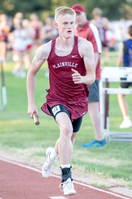 Erik Mackey runs the 4 x 400 Relay at the Plainville Meet