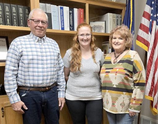 DURING THE JANUARY 6TH STOCKTON CITY COMMISSION MEETING, the two new commissioners were sworn in by assistant city clerk Taylor Ghumm. Pictured from left to right are commissioner and new mayor Bob Becker, assistant city clerk Taylor Ghumm, and new commissioner Deb Miller.