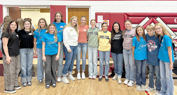 THE STOCKTON JUNIOR HIGH AND HIGH SCHOOL STUCO officers attended the Regional Conference in Quinter on Tuesday, September 30th. Pictured are (from left) Mia Odle, Camille Lowry, Harper Lowry, Remy Muir, Addie Dix, Karleigh Horn, Cheyenne Hoeting, Omree Dibble, Corbyn Glendening, conference guest speaker Kate Garnes, Tessa Look, Bryah Stithem, Henry Berkley, and Evelyn Hilbrink.