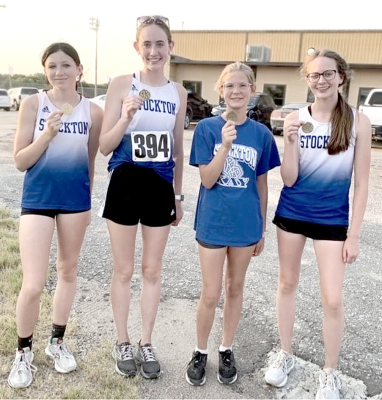 RYLEIGH GARDNER, Cappi Hoeting, Arial Sager and Cheyenne Hoeting each earned individual medals and placed first as a team at the cross country meet held last Thursday at Webster State Park.  (Courtesy Photo)