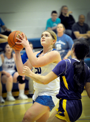 Brin Muir drives to the basket vs. Trego