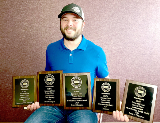 ADAM COMEAU OF PLAINVILLE, owner of Brant’s Market along with his wife Ashley, brought home more than a handful of awards at the 84th Kansas Meat Processors Association Convention &amp; Trade Show held recently in Manhattan.