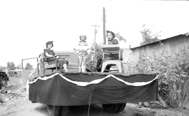 PICTURED are Imogene Gick Fleming, Yvonne Veverka VanDyke, and Velma Diehl Knight. The trio rode on one of the many floats during the 1937 Celebration Parade in Plainville.