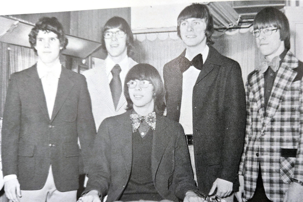 THE 1974-75 SHS HIGH SCHOOL BOYS QUARTET was (from left) Dana Grover, Kerry McCue, Bob Bagby, and Eric Bird. Sam Chesney (seated) was the accompanist.
