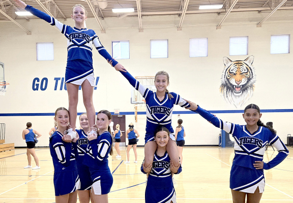 THE STOCKTON JUNIOR HIGH CHEERLEADERS showed off their stunting at the Tiger Nation Kick-Off. They are from left: (bases) Addie Dix, Hadlee Sterling, Brooklyn Couse, Corbyn Glendening, Adrienne McCoy, (flyers) Remy Muir, and Harper Lowry.