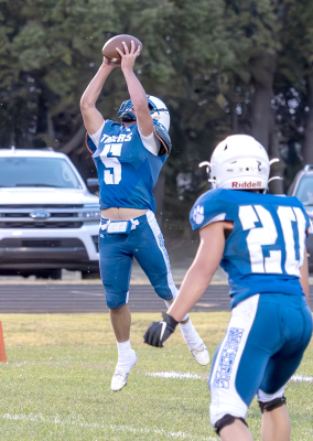 Emerson Lowry intercepts a pass vs. Decatur Community (with Cason Iwanski, #20)