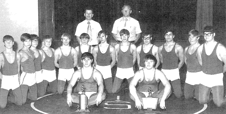 ON THE 1972 SHS WRESTLING TEAM were (front row) John Hageman, Don Jenkins; (back row) Blaine Hageman, Dwight Schneider, Brad Hrabe, Greg Hagan, Shawn McCall, Brad Muir, Dean Couch, Delwin LaRue, Don Bedore, David Schneider, Ron Riedel, Kevin Odle; (back row) Coach Don LaRue and Coach Emery Hart.