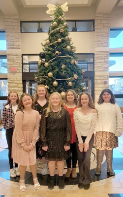 THE STOCKTON SIXTH-GRADE VOCALISTS who performed at the Northwest Kansas Music Educators Association (KMEA) Mini-Convention II Concert in Hays on Saturday, December 7th, were (front row, from left) Tessa Look, Lily Yohon, Kelsey Clayton; (back row) Omree Dibble, Emmalyn Dixon, Shelby Thayer, and Emilee Brown.