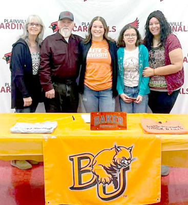 PLAINVILLE HIGH SCHOOL SENIOR CAYDANCE CARTER has chosen to further her academic and sports careers at Baker University following her signing on January 22. Carter will participate in both track and wrestling for the Wildcats.Among those on hand for her signing that day were her grandparents, Lana and Randy “Doc” Thompson, her sister Brynn Earl, and her mother, Naomi Thompson. (Courtesy Photo)