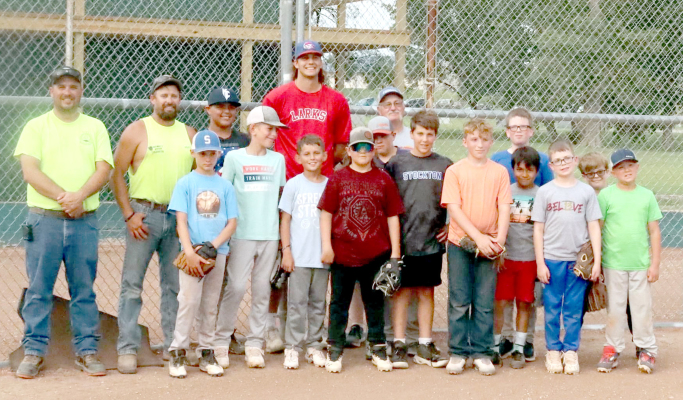 Larks pitcher hosts camp for Legions baseball team