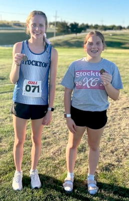 Cheyenne Hoeting (2nd Varsity) and Mia Odle (1st JV) at Smith Center XC Meet