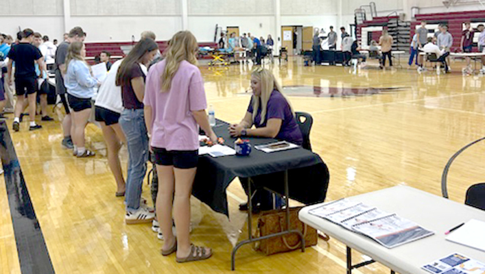 STUDENTS FROM Plainville, Palco, and Stockton High Schools engaging with local professionals at the Rooks County Healthcare Workforce Career Fair, exploring exciting opportunities in the healthcare field.