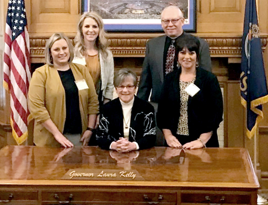 A DELEGATION FROM THE CITY OF STOCKTON greeted Governor Laura Kelly while in Topeka for scheduled meetings with state agencies and legislators on Monday and Tuesday of last week. Shown with the governor are Solomon Valley Manor Administrator Amanda Atkisson, city councilman Bob Becker, city manager Courtney Flower, and city councilwoman Jesica Kerr. Councilman Adam Bryant was also with the group on Monday.