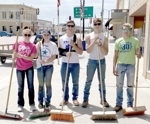 lifeguards with brooms