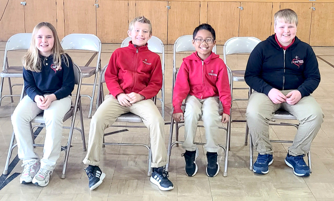 Representing Sacred Heart at the Rooks County Spelling Bee on Tuesday, February 3rd, at Plainville were (from left) Ruthie Brewster (fourth place), Jack Hillard (third place), Jesse Akoh (second place), and Max Brewster (first place).  (Courtesy Photo)