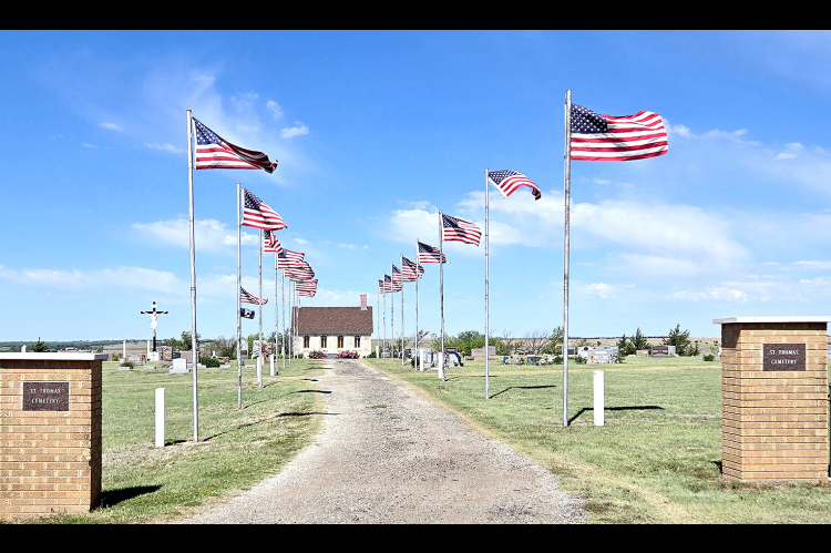 THE AVENUE OF FLAGS at the St.Thomas Cemetery created a beautiful tapestry of remembrance on Memorial Day to honor the courage and sacrifice of those who shaped our freedom.