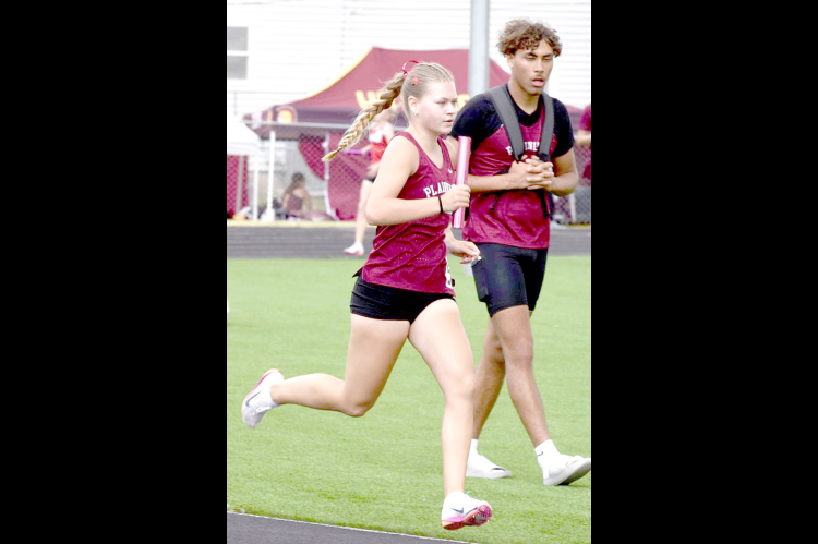 Brilynn Trumpp being cheered on by Draden Puckett at Regionals (Photo Courtesy of Candace Rachel)